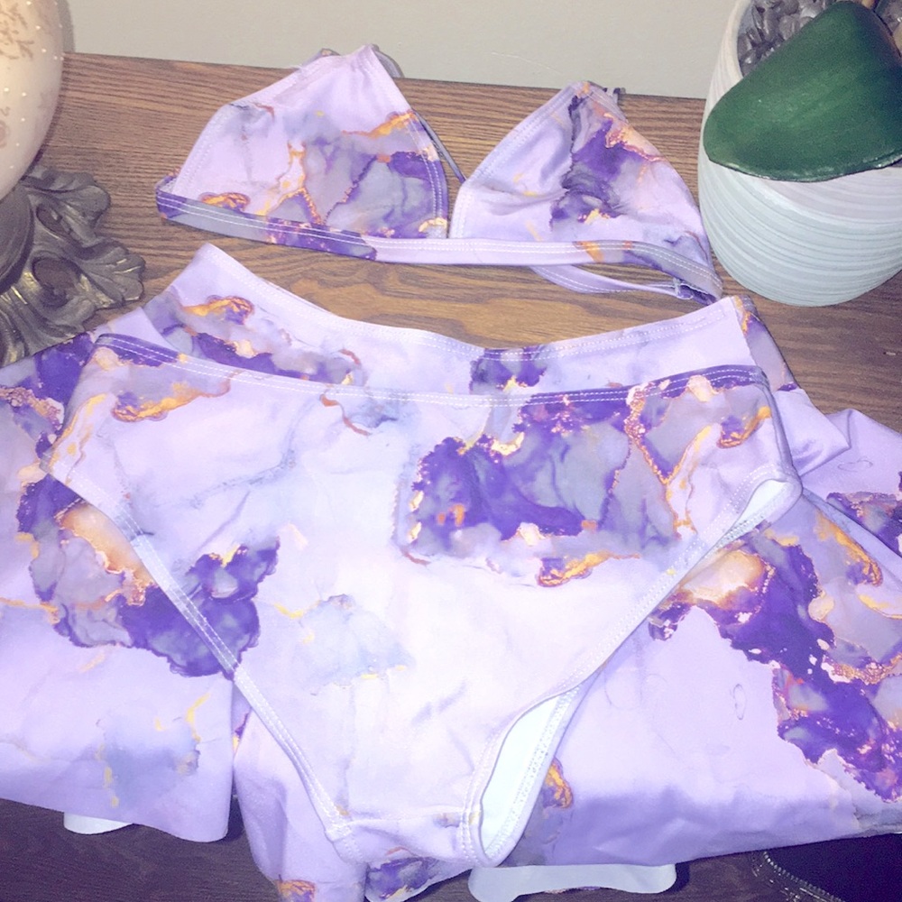 bikini with cover up skirt from the brand SHEIN size small